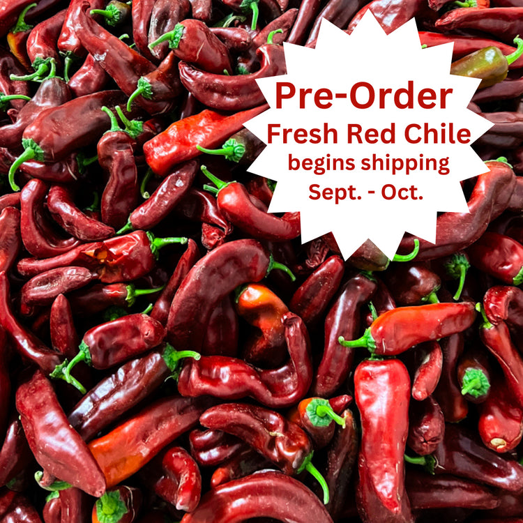 A close-up image of numerous Fresh Hatch Red Chiles with a label stating "pre-order fresh Hatch red chile begins shipping Sept. - Oct.