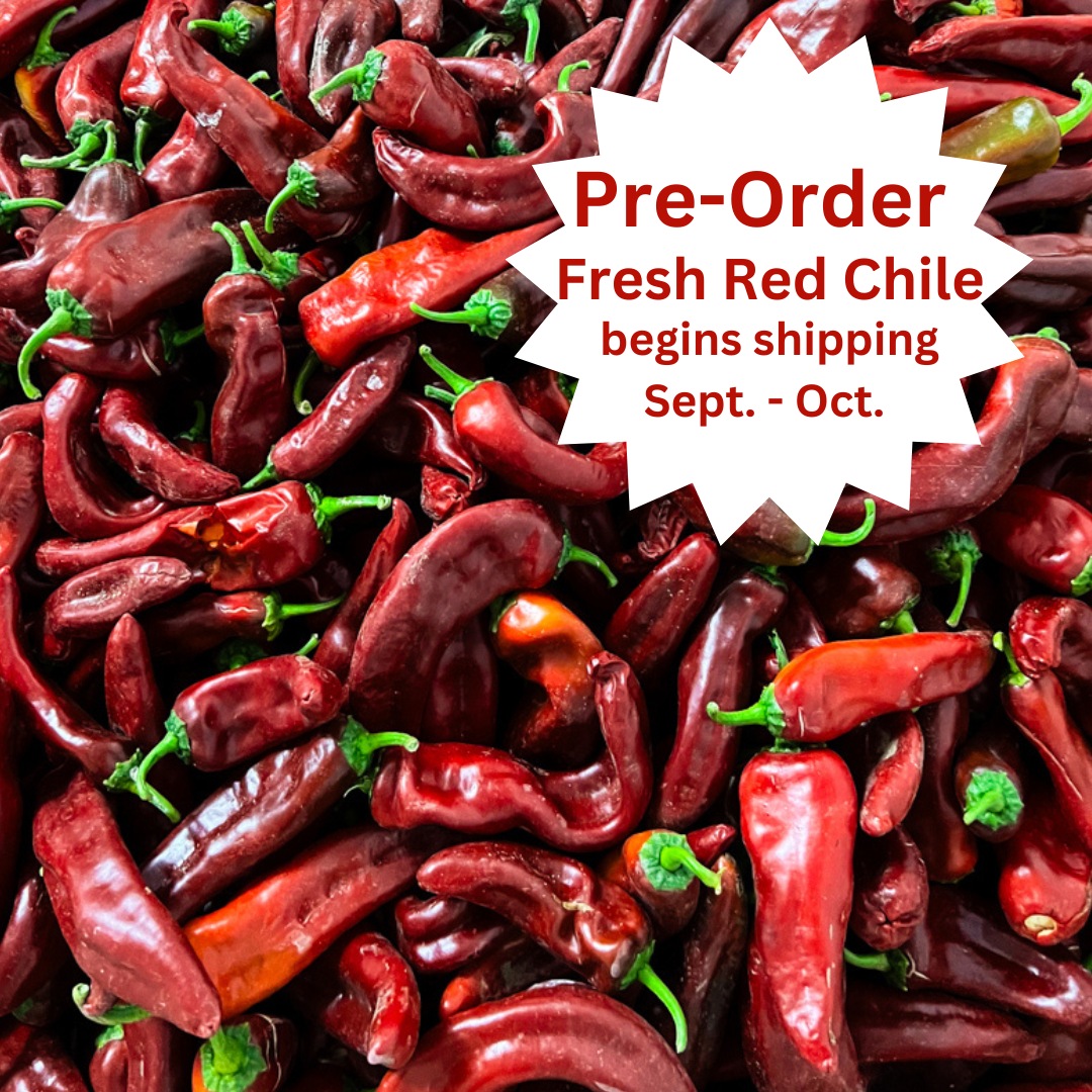 A close-up image of numerous Fresh Hatch Red Chiles with a label stating "pre-order fresh Hatch red chile begins shipping Sept. - Oct.