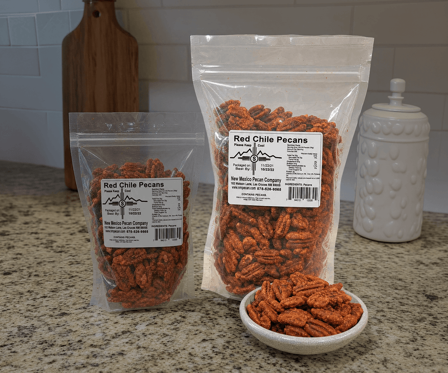 New Mexico Red Chile Pecans in small and large resealable bags beside a dish