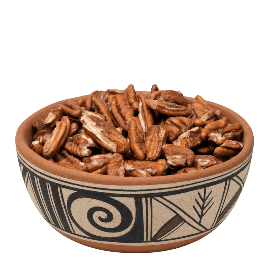 Pecan pieces in a black-and-white Southwestern pottery bowl