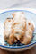Battered Hatch green chile rellenos on a decorative plate