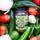 Jar of Hatch chile salsa, hot, surrounded by fresh chiles, tomatoes and garlic