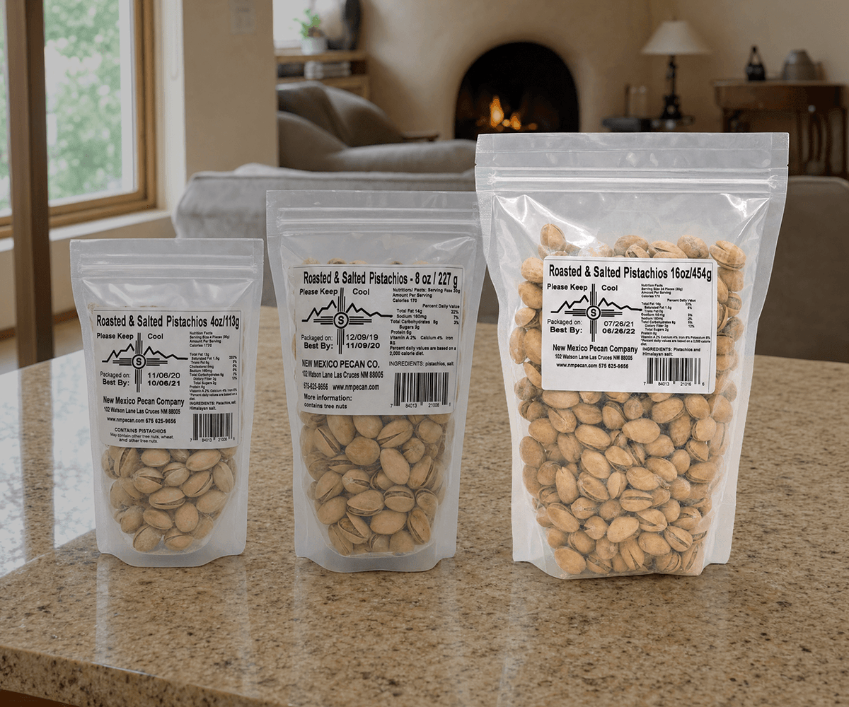 Roasted salted pistachios in 4, 8, and 16 oz resealable bags on a counter