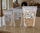 Roasted salted pistachios in 4, 8, and 16 oz resealable bags on a counter
