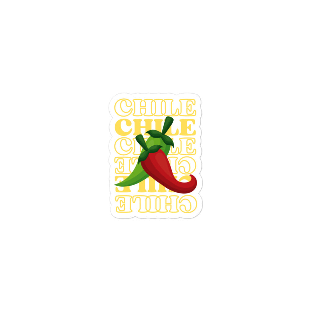 Illustration of a vibrant red and green chili pepper above bold, stylized text that reads "chile chile chile" in yellow and white colors, all set on a durable Red & Green Sticker.
