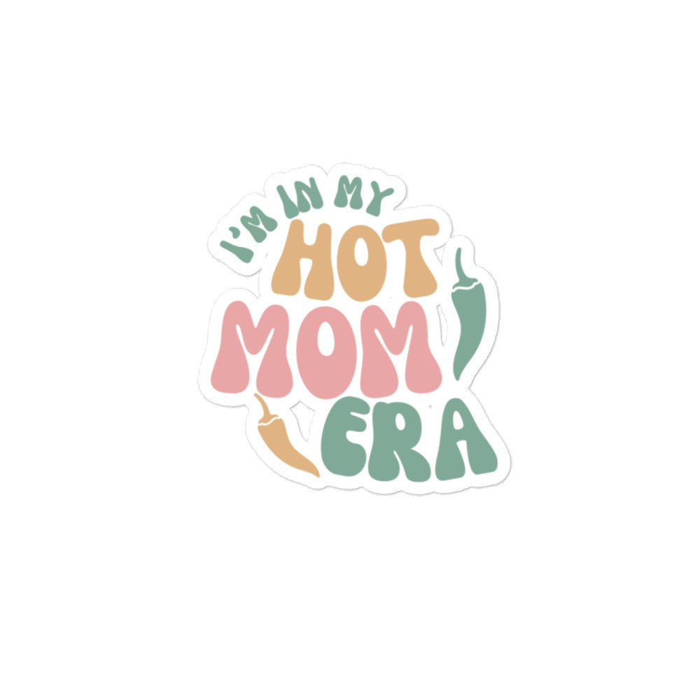 Era Sticker with pastel-colored text that reads "i'm in my hot mom era," surrounded by a white border. The design features soft, playful fonts in shades of pink, green, and peach.