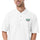 Hatch Chile Store premium polo in white, worn by a model