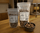 New Mexico Chocolate Amaretto pecans in two resealable bag sizes beside a filled bowl