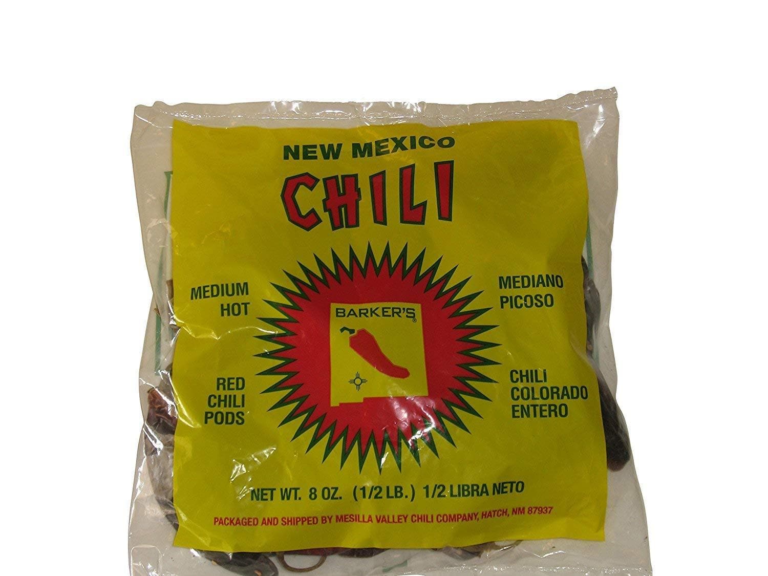 A package of Dried Hatch Red Chile Pods, labeled "medium hot" and "mediano picoso," containing red chili pods with a vibrant yellow and red design.