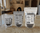 Dark chocolate pecans in 4, 8, and 16 oz resealable bags on a kitchen counter