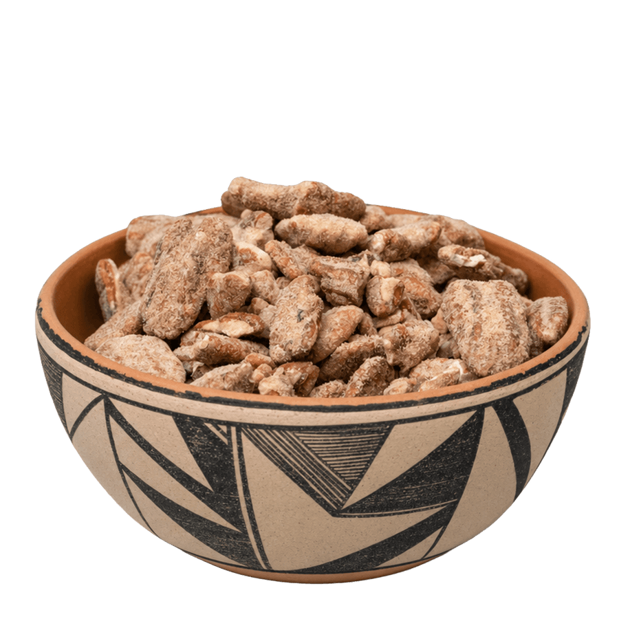 Sweet and hot seasoned pecans in a black-and-white New Mexico pottery bowl