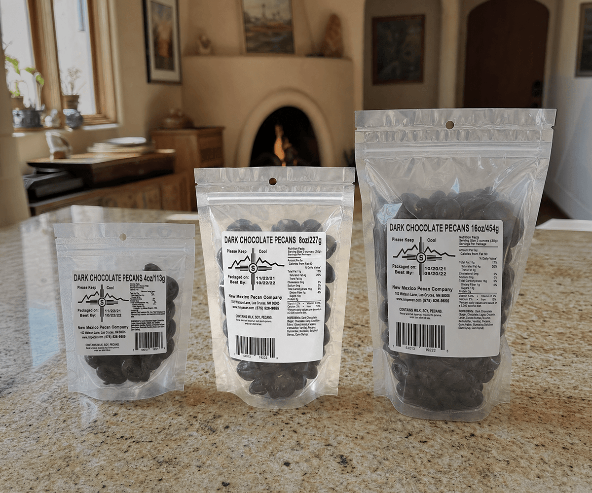 Dark chocolate pecans in 4, 8, and 16 oz resealable bags
