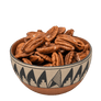 Pecan halves in a Southwestern pottery bowl with black geometric pattern