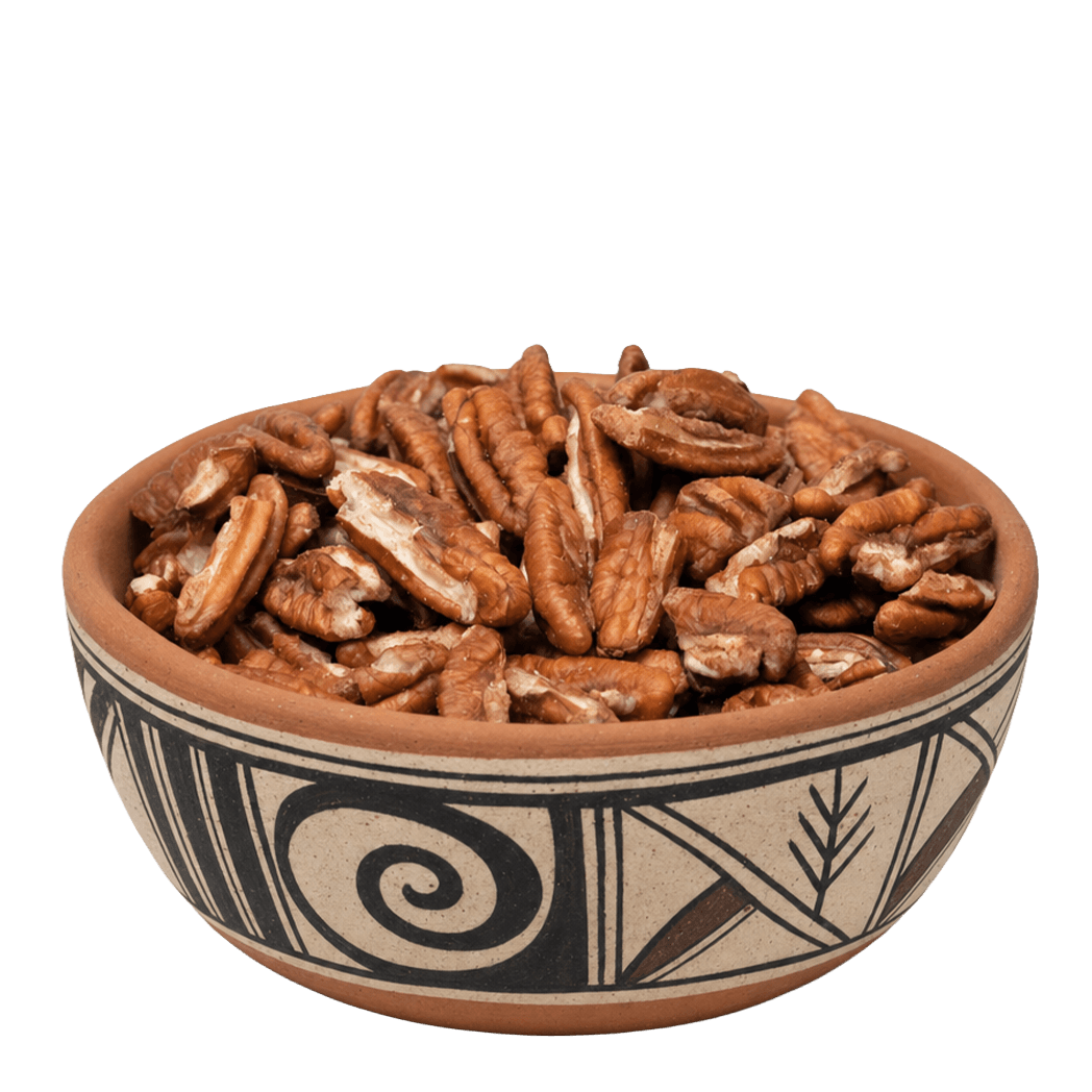 Pecan pieces in a black-and-white Southwestern pottery bowl