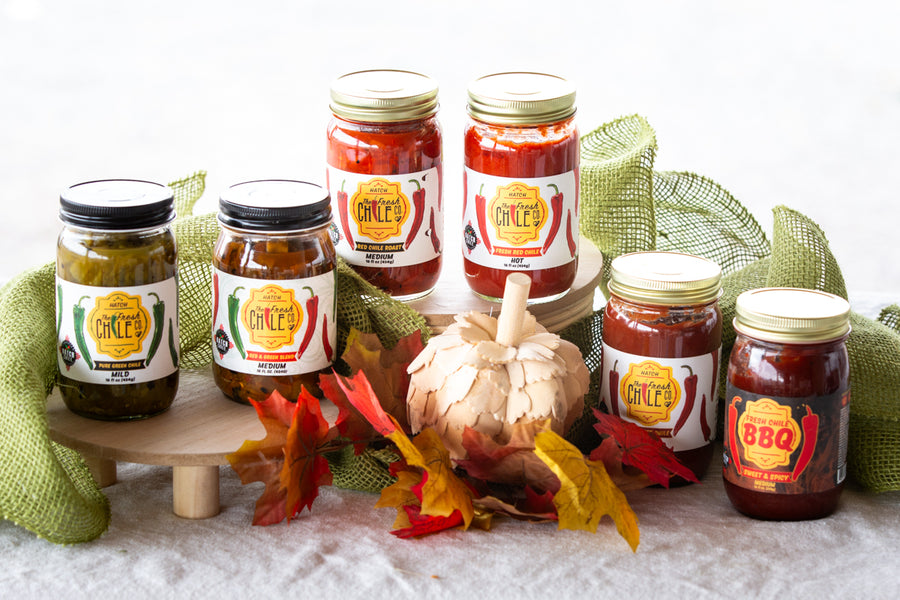 A Saucy Thanksgiving bundle of Hatch chile sauces and salsas with fall decorations