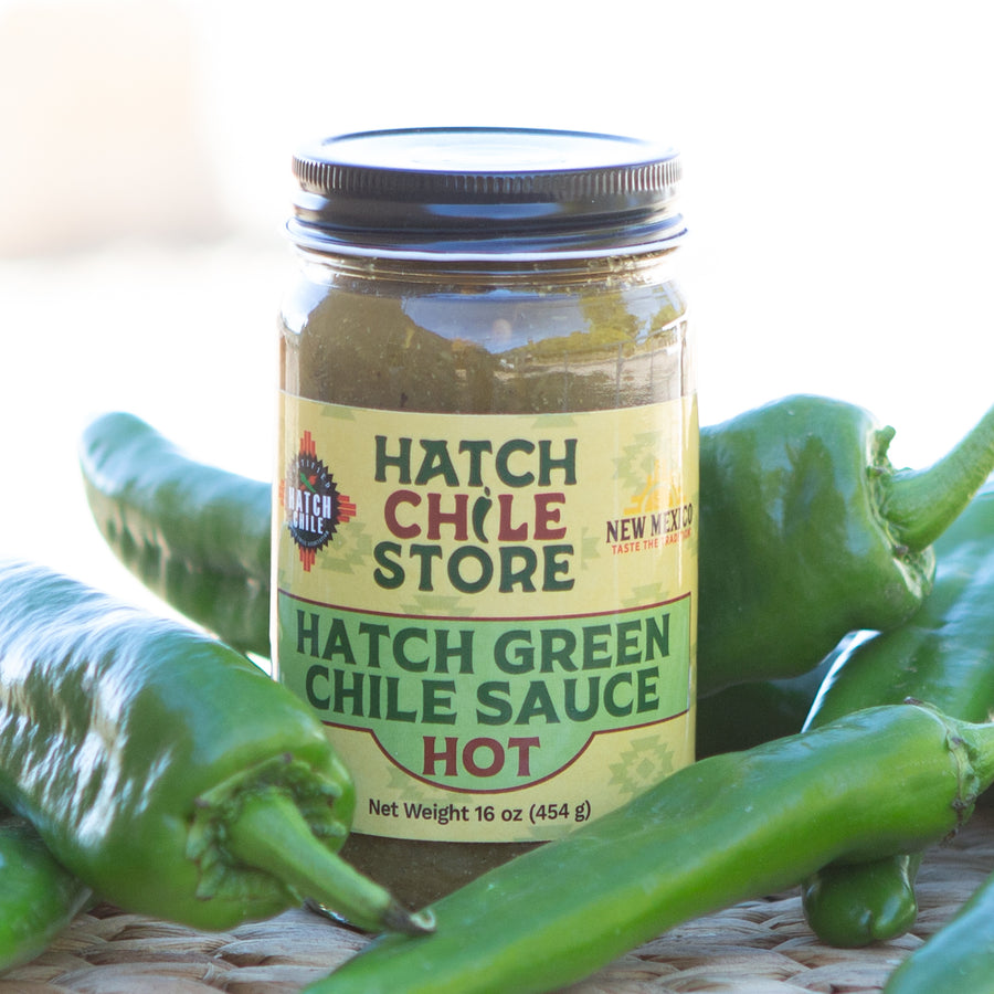 Jar of Hatch green chile sauce, hot, with fresh green chile pods