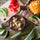 Hatch green chile stew with avocado, tomato and shredded cheese toppings