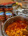 Posole simmering with Ol' Gringo Red Chile Sauce jars