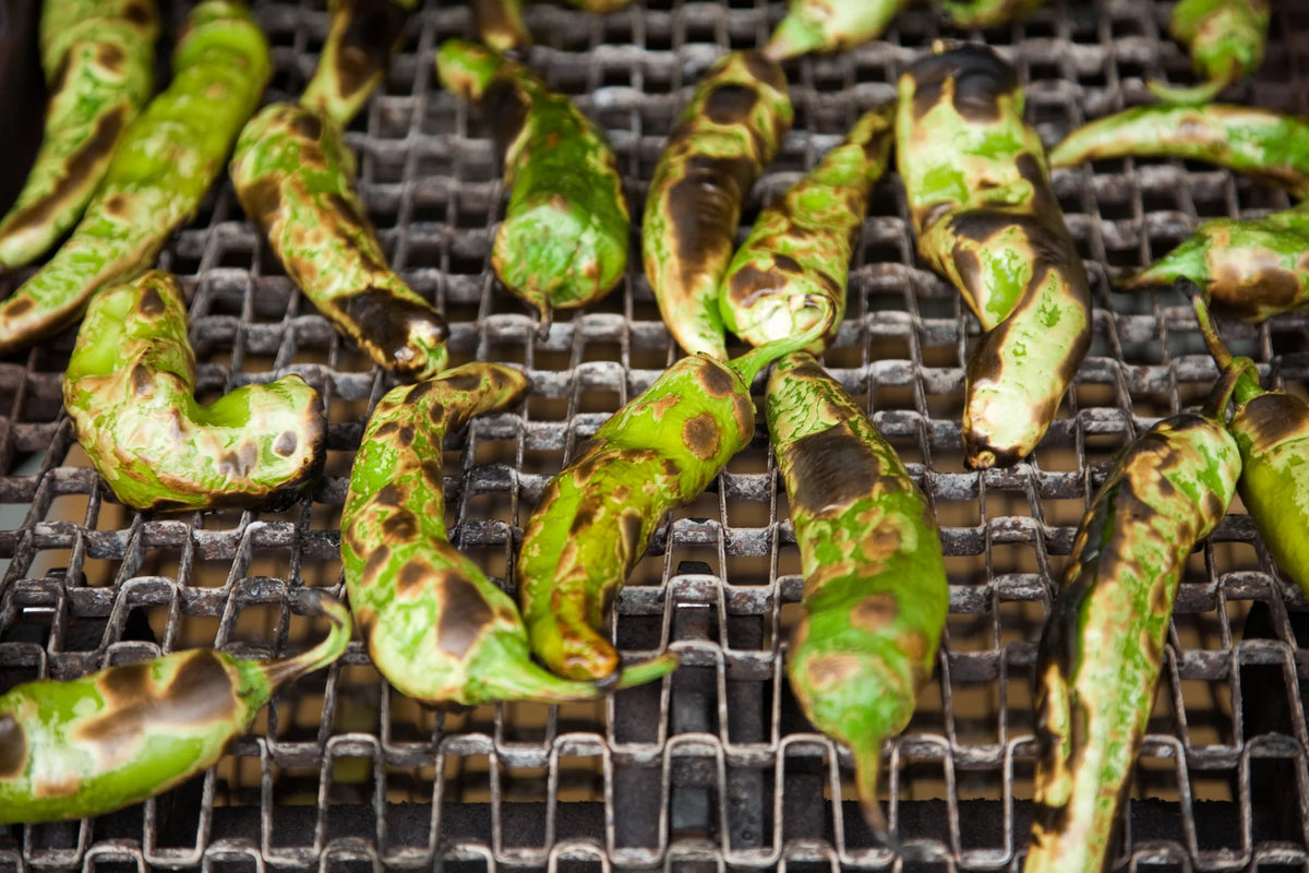 Hatch green chile blistering on the roaster