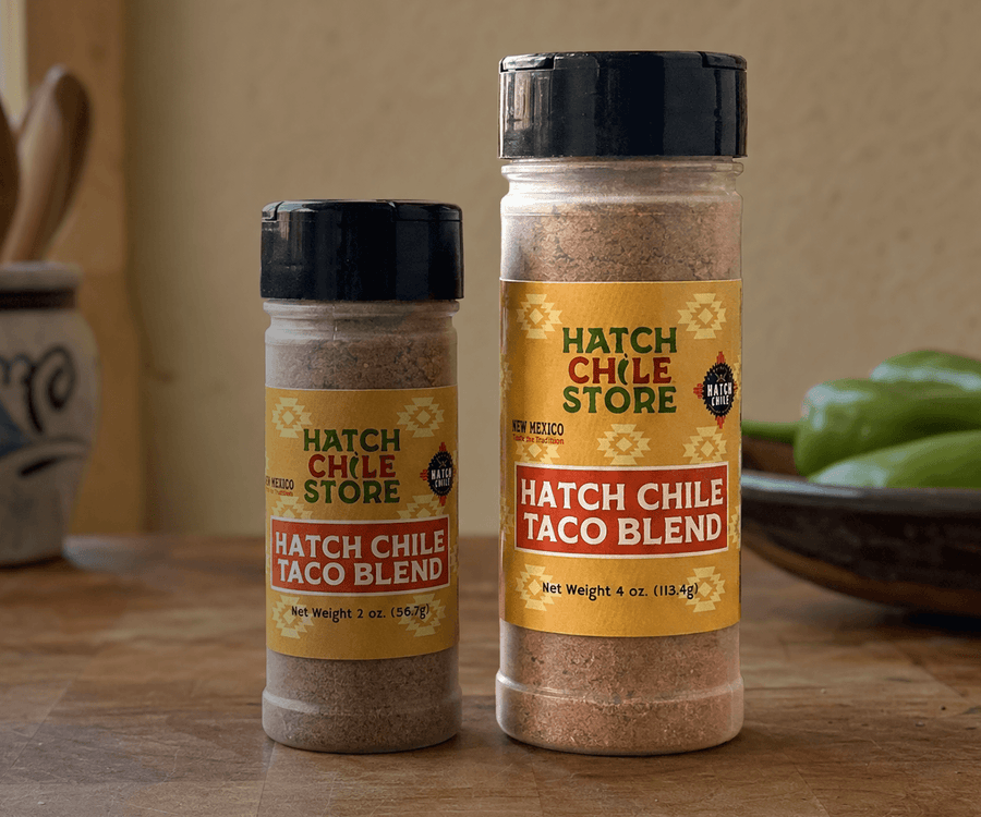 Hatch Chile taco blend in 2 oz and 4 oz shaker jars with green chile behind