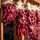 Close-up of Sandia red chile ristras drying in the sun