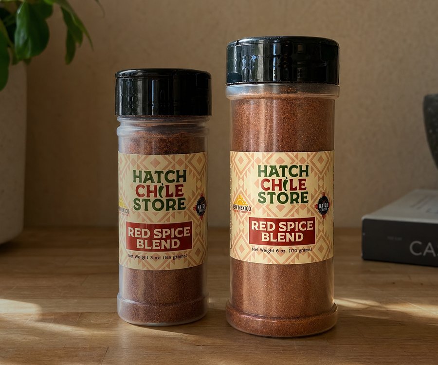 Hatch red spice blend shaker jars in 3 oz and 6 oz sizes on wood