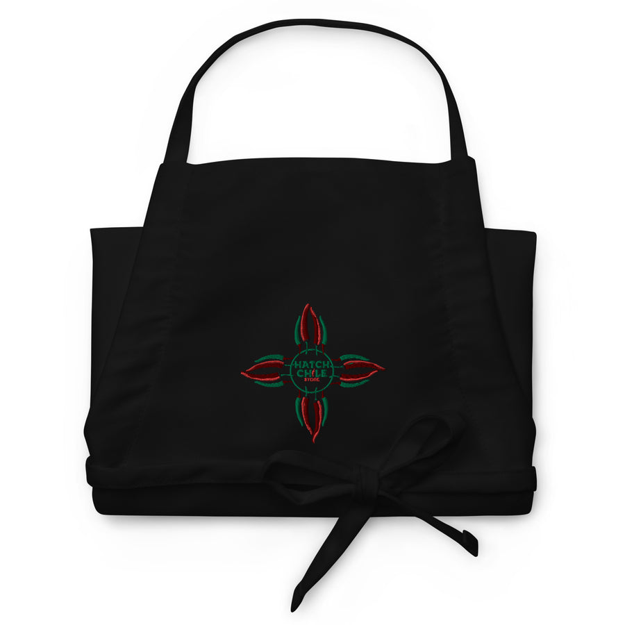 Chile Zia Embroidered Apron — embroidered apron in black, front view