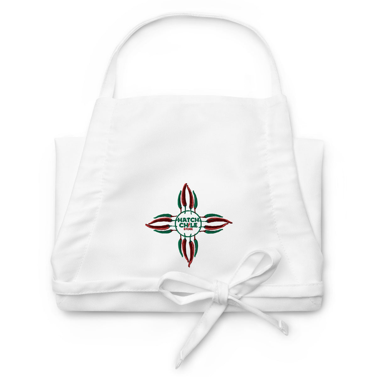 Chile Zia Embroidered Apron — embroidered apron in white, front view