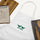 Got Chile? Embroidered Apron — embroidered apron in white, close-up detail