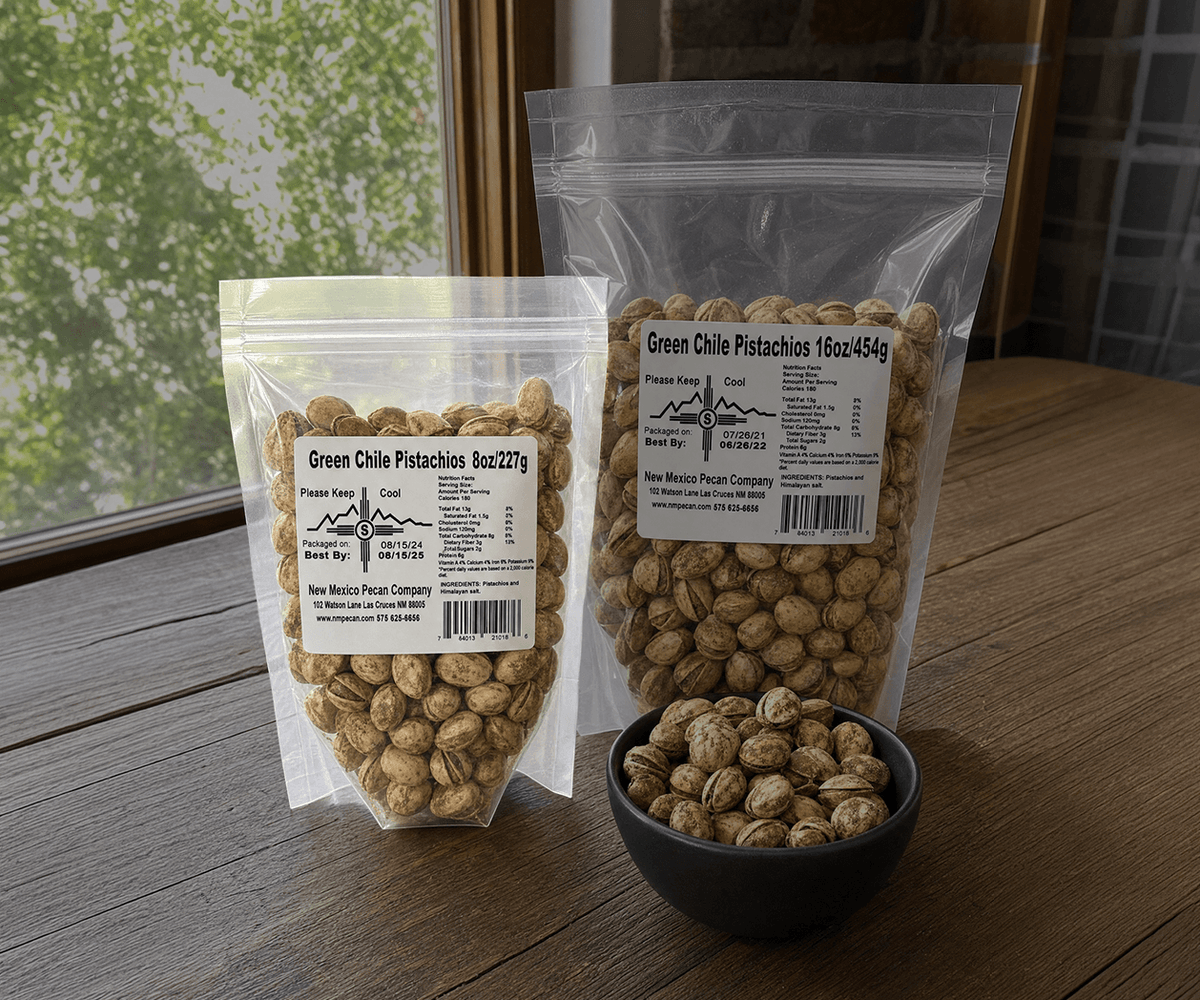 Green chile pistachios in 8 oz and 16 oz resealable bags on a wooden table
