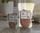 Green chile pecans in 8 oz and 16 oz resealable bags by a window