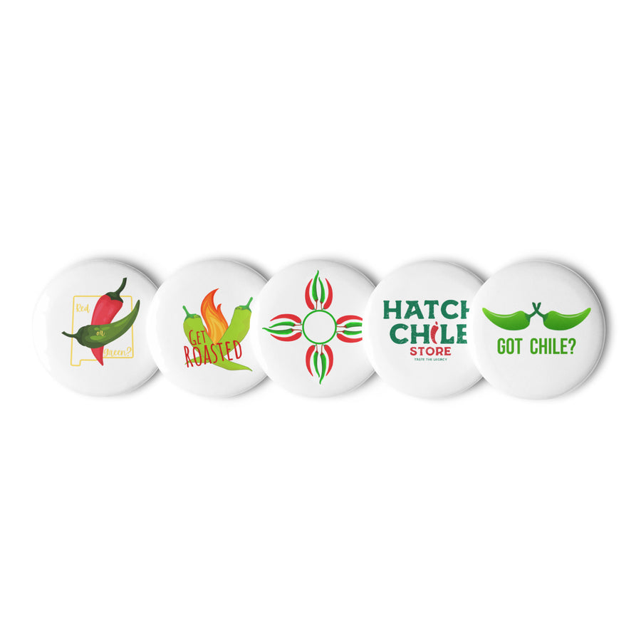 Set of five Hatch Chile Store enamel pins in a row