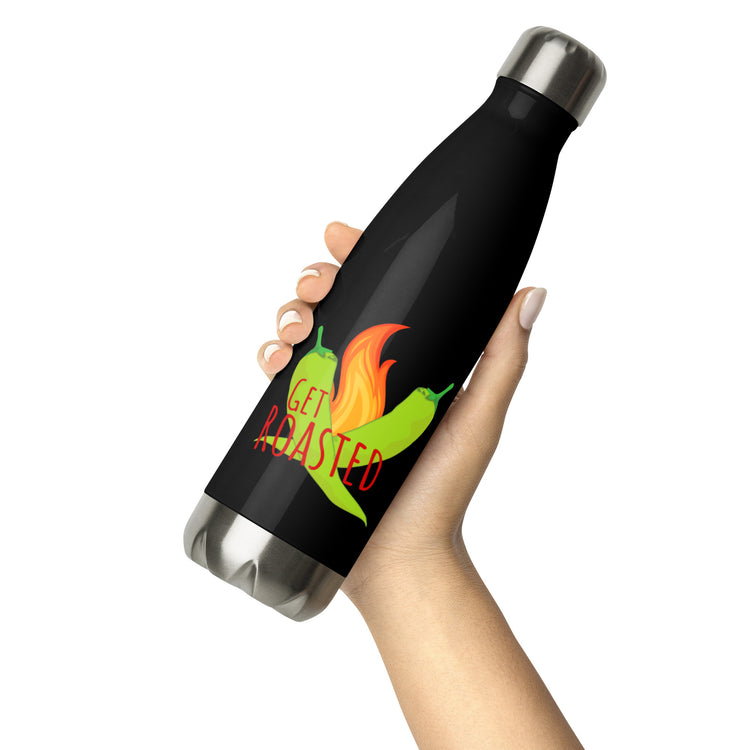 A hand holding a black Get Roasted water bottle with a colorful design featuring flames and the text "get roasted" on it, isolated on a white background.