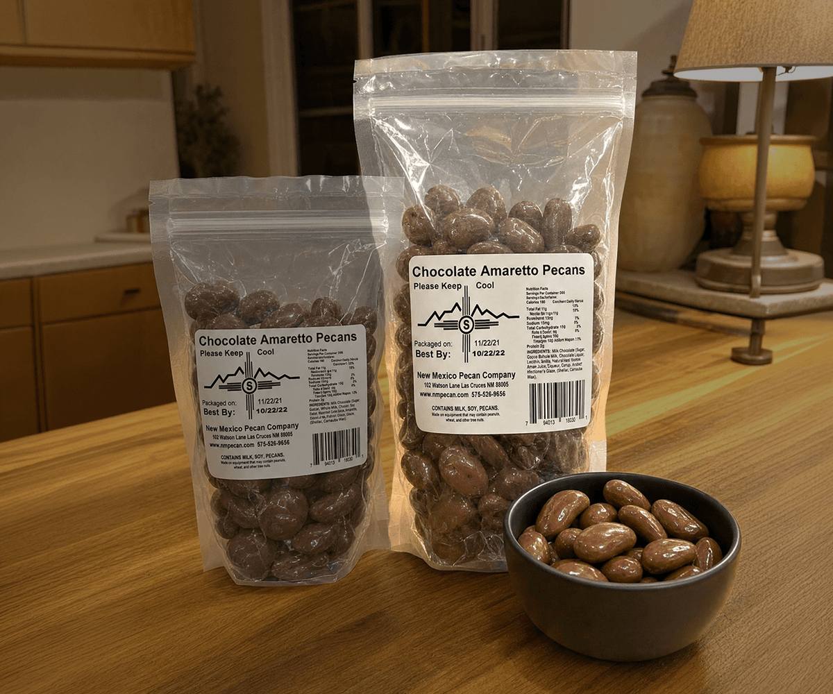 New Mexico Chocolate Amaretto pecans in two resealable bag sizes beside a filled bowl
