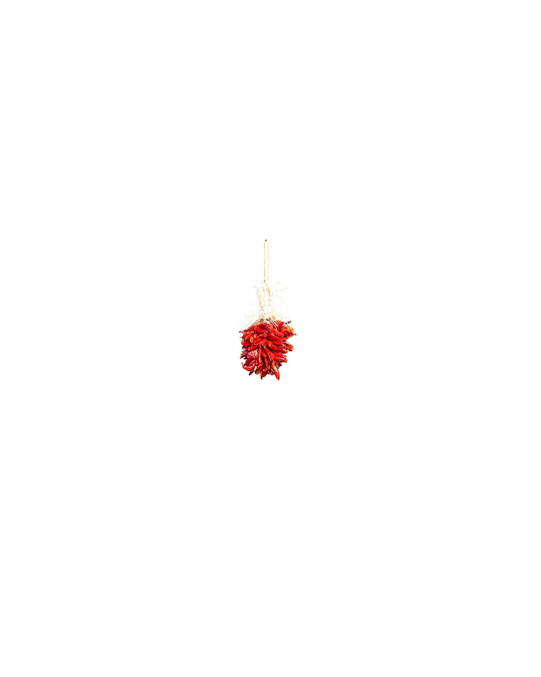 A single Chile Pequin Ristras hangs vertically against a plain white background, embodying New Mexican charm.