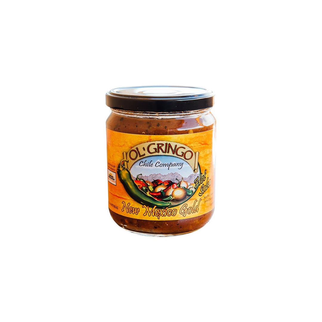 A jar of New Mexico Gold Salsa featuring green chile with a vibrant label displaying chilies and southwestern imagery, isolated on a white background.