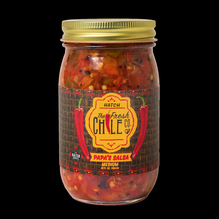 A jar of "Papa's Chunky Hatch Chile Salsa," labeled "Papa's Salsa," filled with colorful chunky vegetables visible through the glass.